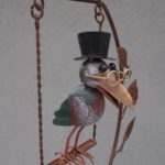 Záhradná  dekorácia  -  sova  na  hojdačke ( A )